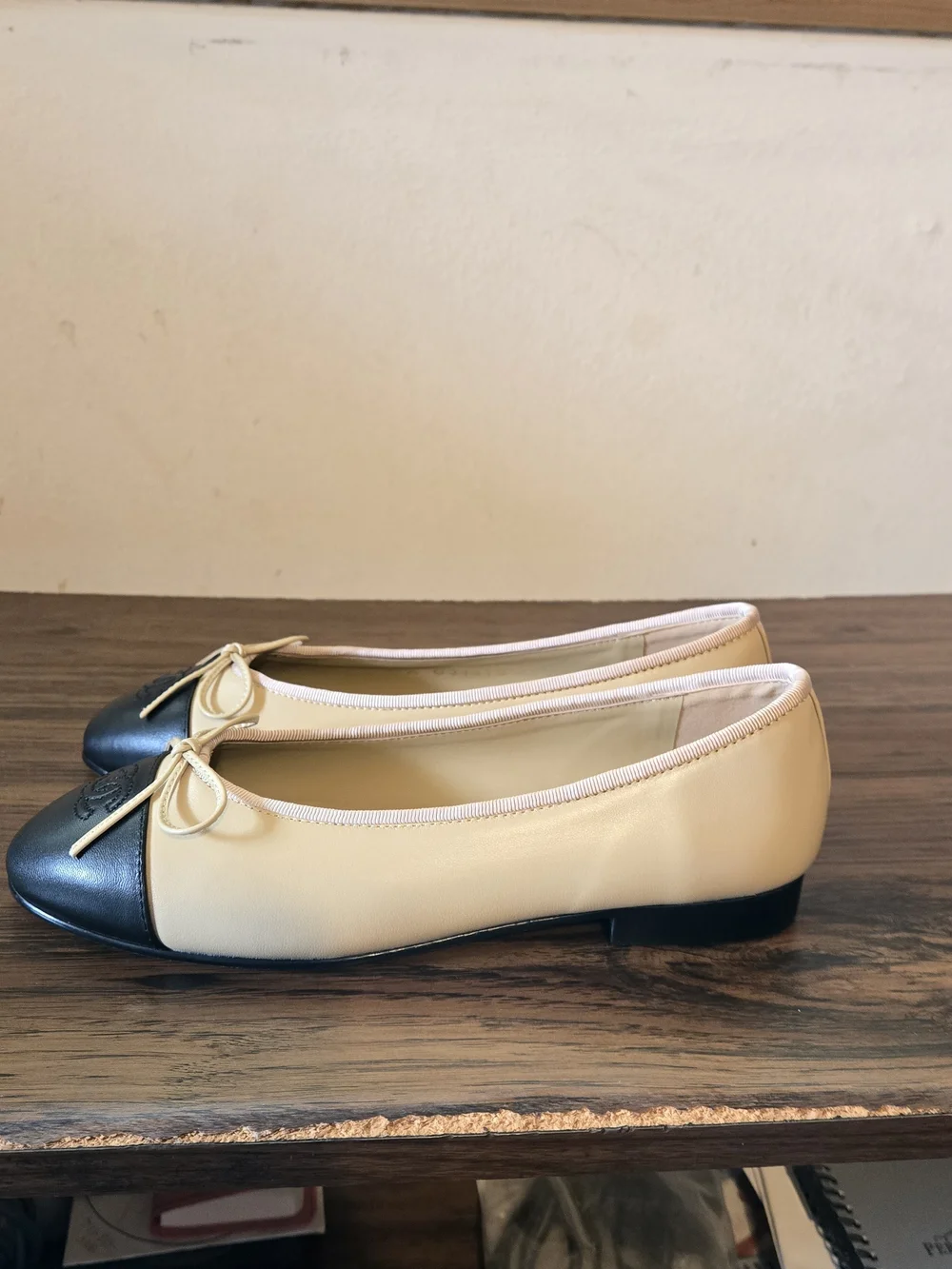 Chanel Two-Tone Leather Cap-Toe Ballet Flats in Beige & Black